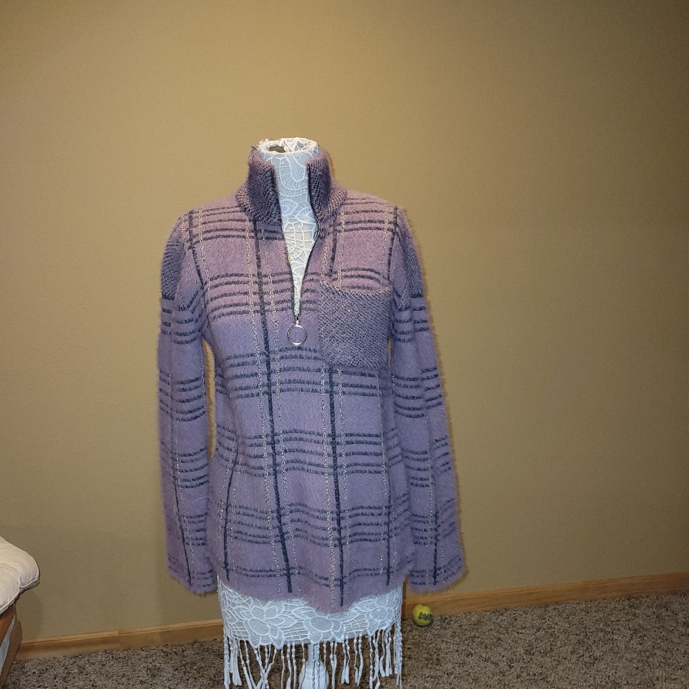 FSL Apparel fuzzy sparkly sweater with half zip in front.